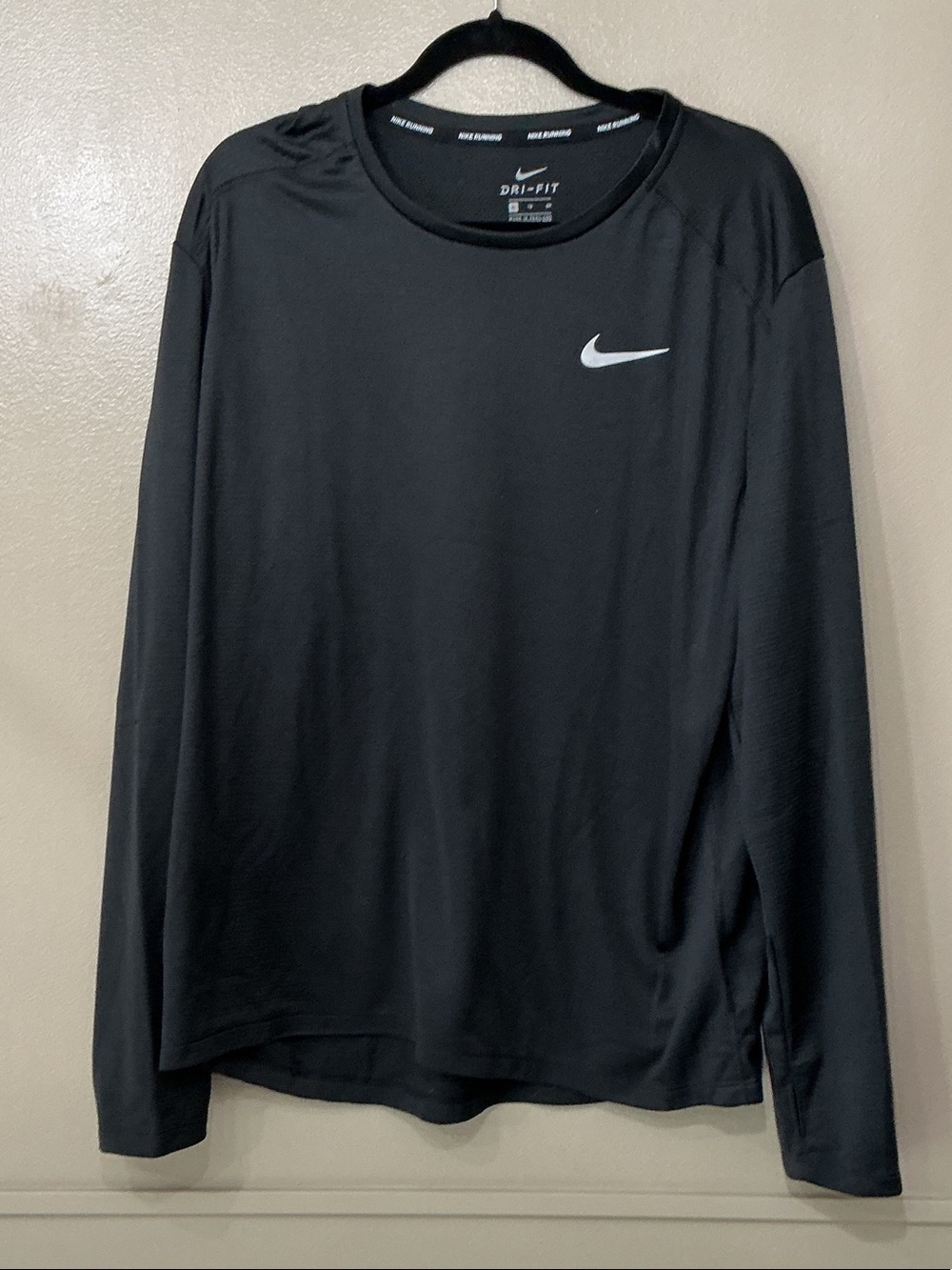 Nike Black Long Sleeve Dri-FIT Top with White Swoosh